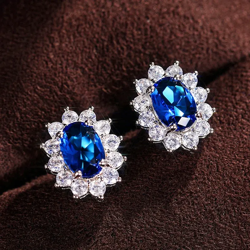 Eastern Aura Oval Blue Gem Earring - Image 0