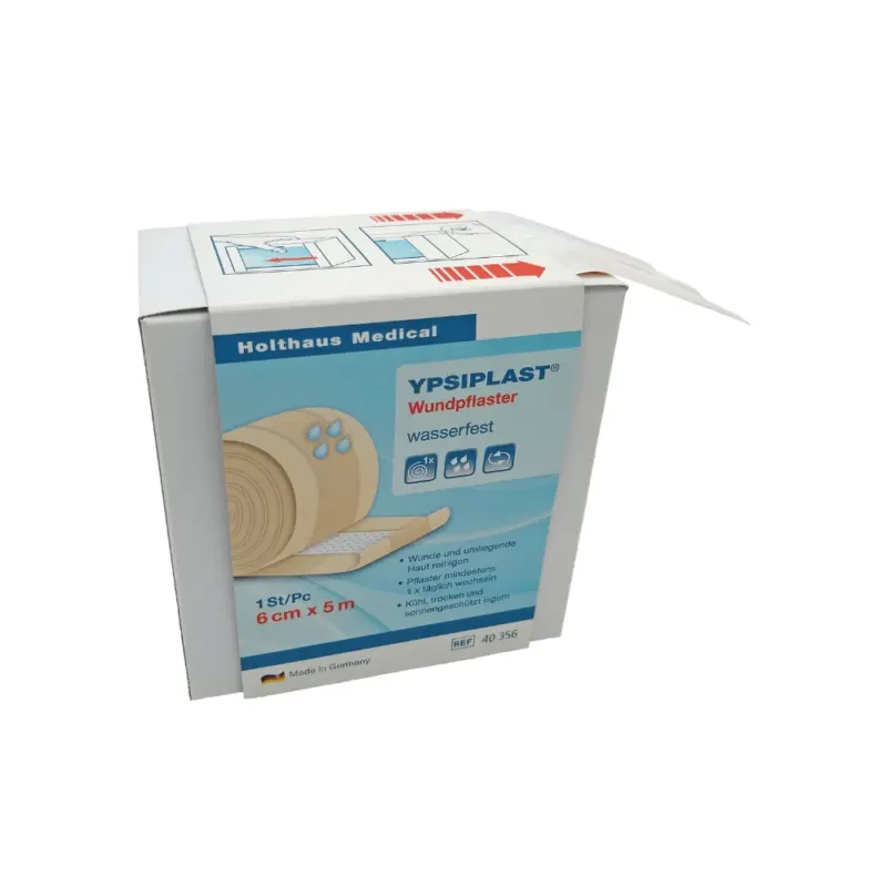 Eine Schachtel Holthaus Ypsiplast Wundpflaster, wasserabweisend von Holthaus Medical GmbH & Co. KG. Die überwiegend weiße Schachtel mit blauem Text bietet einen Blick auf das Pflaster im Inneren. Ideal für kleine Wunden, beschreibt es das wasserfeste Wundpflaster mit den Maßen 6 cm x 5 m. Auf der Verpackung ist außerdem vermerkt, dass es in Deutschland hergestellt wird.
