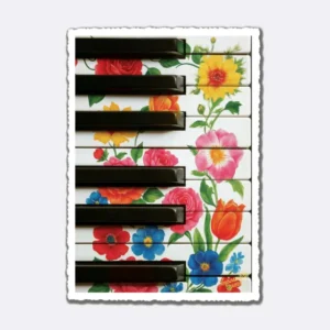 Postkarte mit Blumenmuster auf Klaviertasten und Schriftzug "Impossible Card"