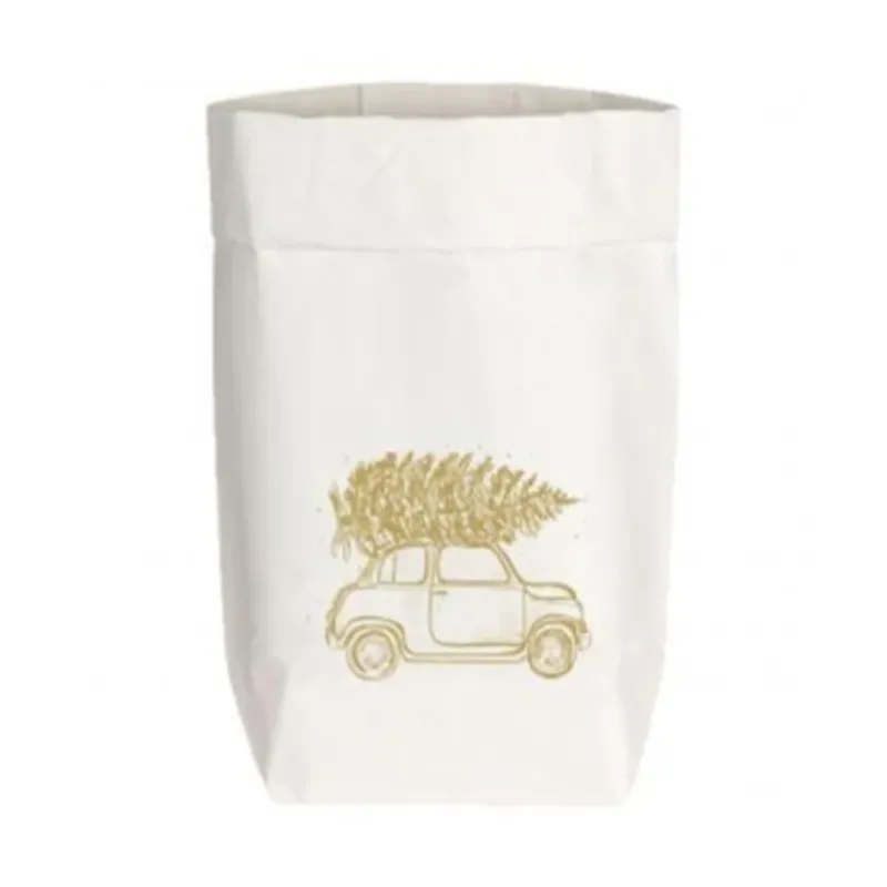 Ein Papiertüte mit einem Auto das eine Tanne Transportiert