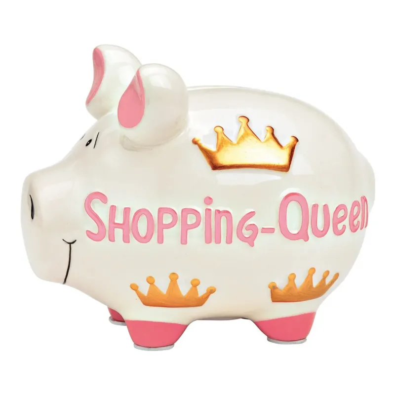 Weißes großes Sparschwein aus Keramik, handbemalt mit rosenen Details (Füße und Schweinohren) und goldenen Kronen, Gesichtszüge in Schwarz gemalt, rosaner Schriftzug: SHOPPING-QUEEN, 15 x 15 x 17 cm großes Sparschwein
